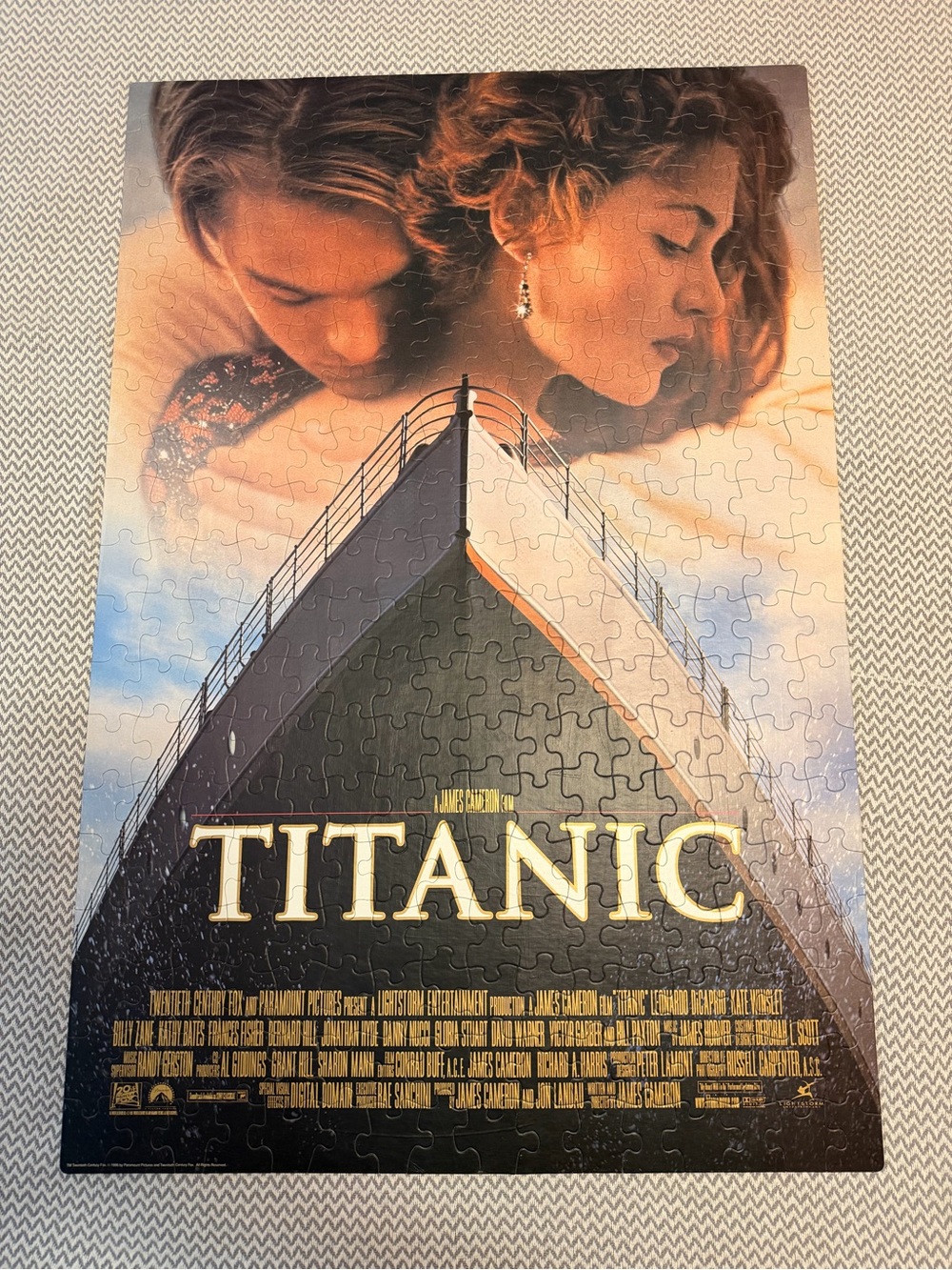 Titanic Movie Poster Puzzle - Iconic Black & Gold Artwork